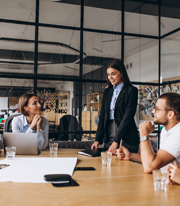 group of people working out business plan office