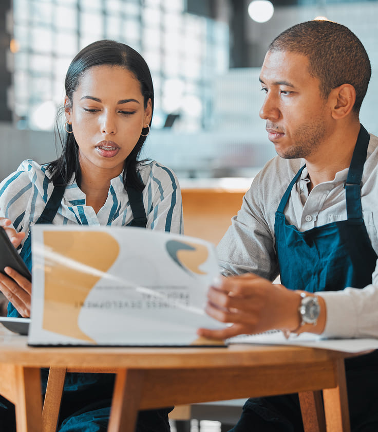 partnership cafe barista entrepreneur small business owners planning budget menu